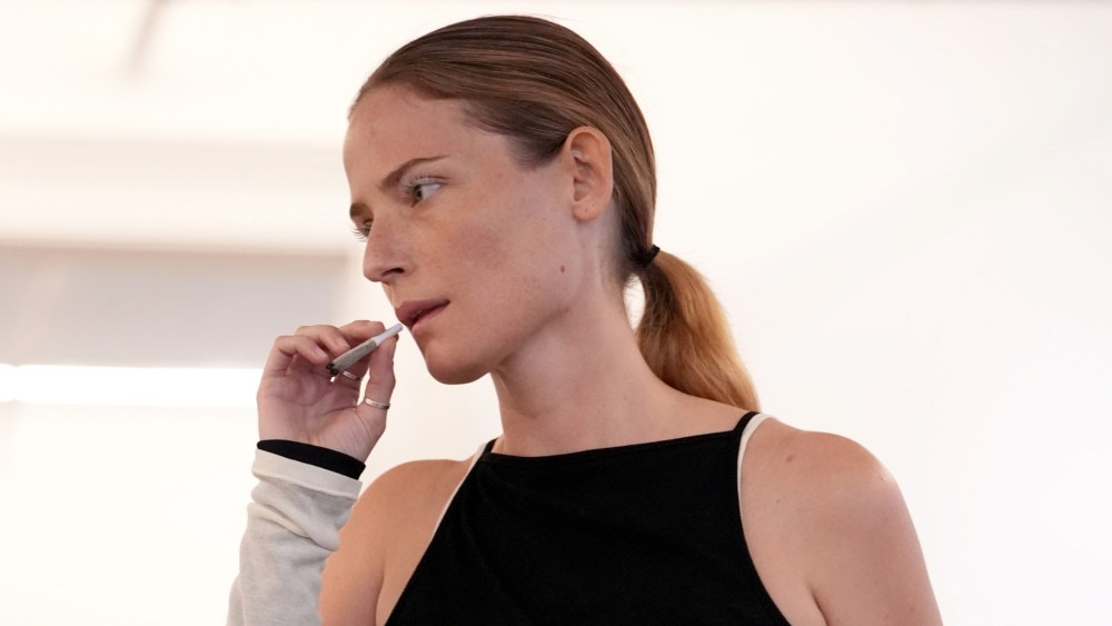 Model smoking cannabis at Eckhaus Latta