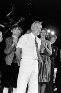 Designer Giorgio Armani poses during the finale of Giorgio Armani Fall 1980 Ready to Wear fashion show organized by Bergdorf Goodman. The show is benefitting film preservation.