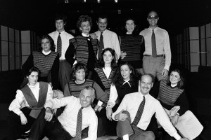 Designer Giorgio Armani, Silvana Armani, Sergio Galeotti, and guests pose for group photo. Some of the staff members wear selections from Armani's ready to wear collection.