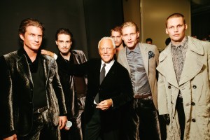 Designer Giorgio Armani backstage before his Giorgio Armani fall 2006 menswear runway show.