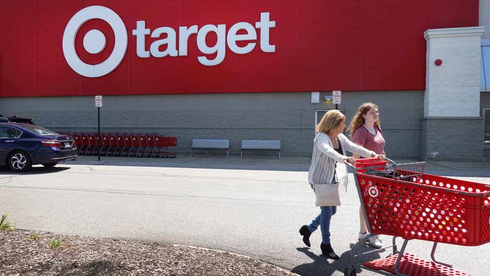 Customers shop at a Target store.