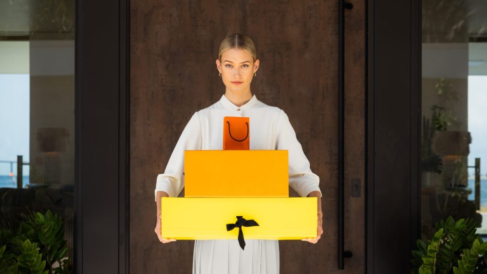 Jason Wu has partnered with The Residences at Mandarin Oriental, Miami to design bespoke uniforms for the property’s striking sales gallery staff—a collaboration that reimagines the “work uniform” through the lens of couture.