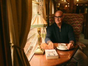 Stanley Tucci in the campaign for N. Peal’s new Art of Travelling collection.