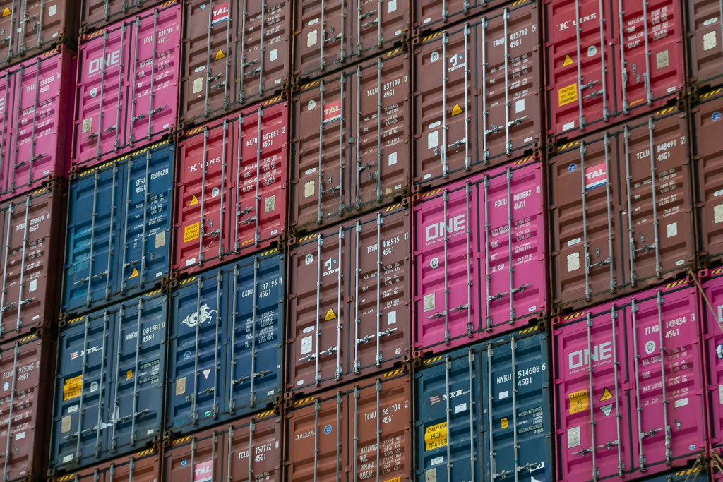 Containers sit on a cargo ship as at the Port of Miami on Saturday, Feb. 20, 2021. 