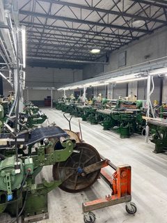 45 Draper X3 shuttle looms and 52 Picanol President looms are available.