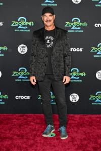 Patrick Warburton at Disney's "Zootopia 2" Premiere held at El Capitan Theatre on November 13, 2025 in Los Angeles, California.
