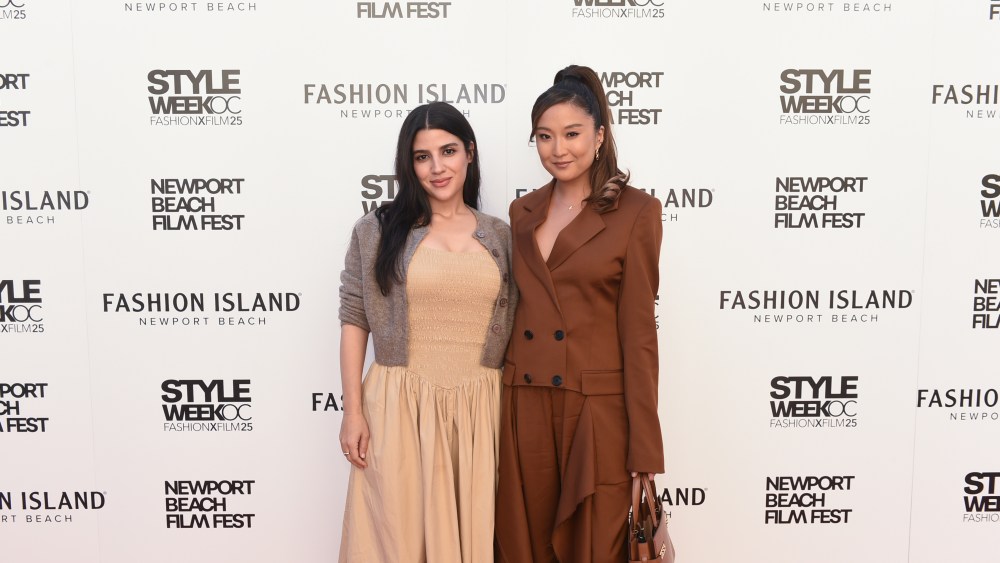 NEWPORT BEACH, CALIFORNIA - OCTOBER 18: Ryma Chikhoune and Ashley Park attend Fashion Island's 14th Annual StyleWeek OC in partnership with The Newport Beach Film Festival on October 18, 2025 in Newport Beach, California. (Photo by Vivien Killilea/Getty Images for StyleWeek Orange County)