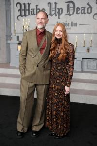 Nathan Johnson and Katie Chastain at Netflix's "Wake Up Dead Man: A Knives Out Mystery" premiere held at the Academy Museum of Motion Pictures on November 17, 2025 in Los Angeles, California.