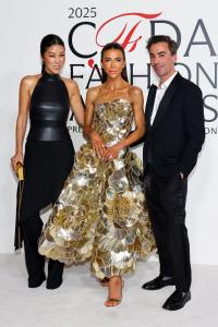 Laura Kim, Skye Hankey and Fernando Garcia at the 2025 CFDA Fashion Awards held at The American Museum of Natural History on November 03, 2025 in New York, New York.