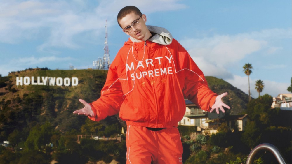 Timothée Chalamet in the "Marty Supreme" tracksuit designed by Doni Nahmias.