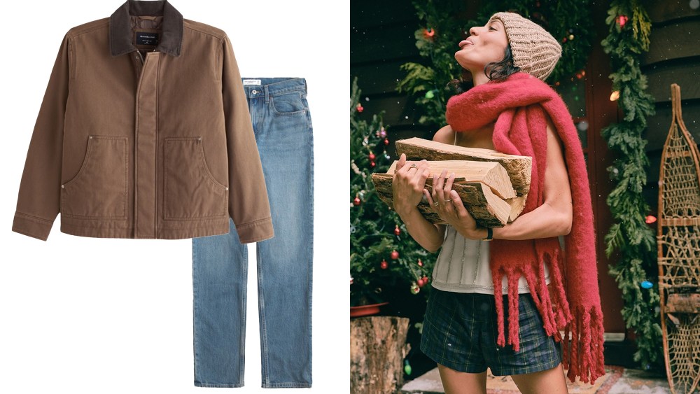abercrombie barn jacket and straight leg jeans over white background; model wearing abercrombie pieces, like a scarf and hat, while carrying logs