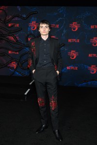 Finn Wolfhard at the "Stranger Things" Season 5 World Premiere held at the TCL Chinese Theatre on November 06, 2025 in Los Angeles, California.