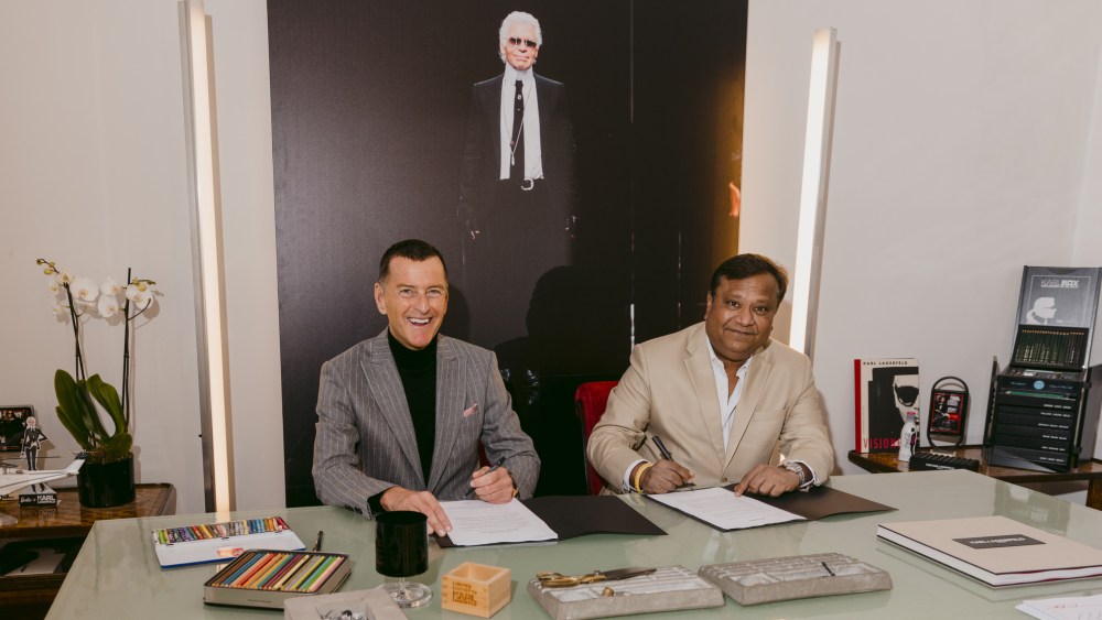 Pier Paolo Righi and Rahul Kumar Gupta sign a partnership to develop branded luxury residences on Al Marjan Island in the UAE.