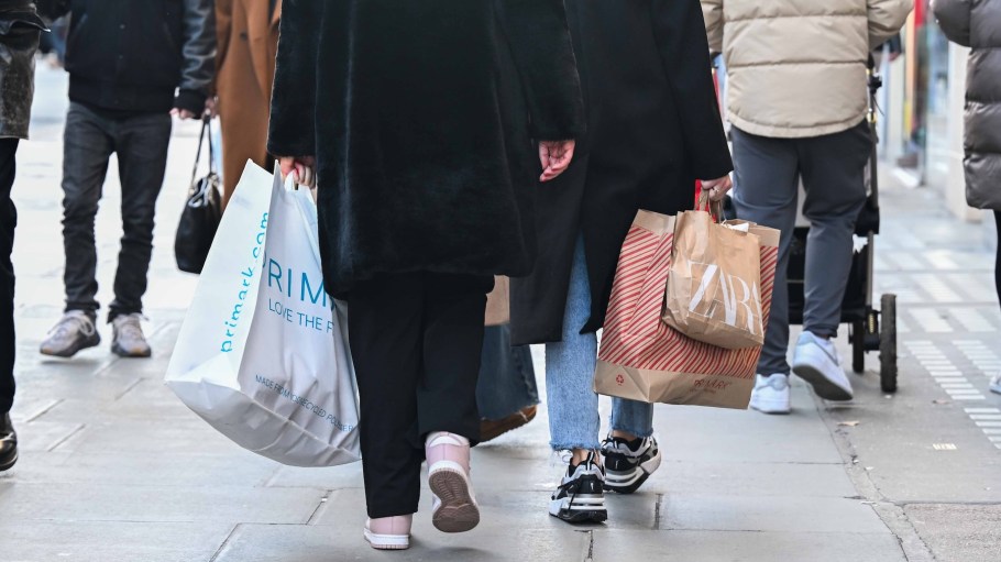 Stores in London display advertisements in their windows for 'Friday' sales as shoppers flock to the city's shopping hubs on November 22, 2024.