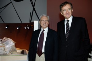 Architect Frank Gehry (L) and Bernard Arnault attend Louis Vuitton's Foundation for Creation press conference. (Photo by Dominique Maître/WWD/Penske Media via Getty Images)