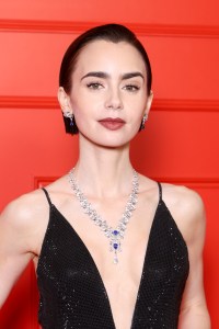 PARIS, FRANCE - DECEMBER 15: Lily Collins attends the "Emily In Paris" - Season Five - Netflix Paris Premiere at Le Grand Rex on December 15, 2025 in Paris, France. (Photo by Pascal Le Segretain/Getty Images)