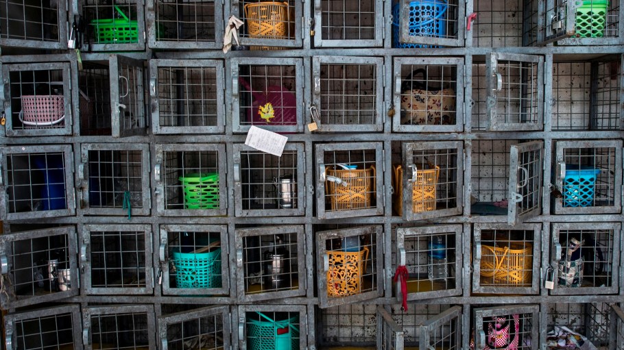 Lunch boxes of garment workers are seen in cubbies at a factory in Yangon/