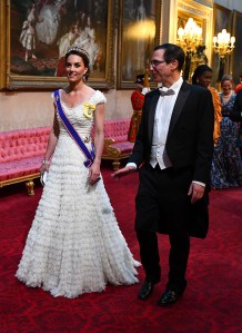 LONDON, ENGLAND - JUNE 03: Catherine,Duchess of Cambridge and United States Secretary of the Treasury, Steven Mnuchin arrive through the East Gallery for a State Banquet at Buckingham Palace on June 3, 2019 in London, England. President Trump's three-day state visit will include lunch with the Queen, and a State Banquet at Buckingham Palace, as well as business meetings with the Prime Minister and the Duke of York, before travelling to Portsmouth to mark the 75th anniversary of the D-Day landings.  (Photo by Victoria Jones- WPA Pool/Getty Images)