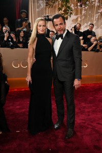 Carolyn Murphy and Will Arnett at the 83rd Annual Golden Globes held at The Beverly Hilton on January 11, 2026 in Beverly Hills, California.