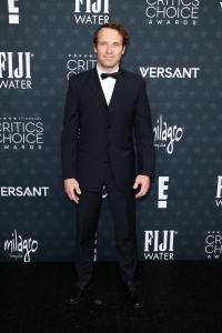 Michael Ralla at the 31st Annual Critics Choice Awards held at Barker Hangar on January 04, 2026 in Santa Monica, California.
