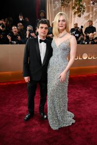 Gus Wenner and Elle Fanning at the 83rd Annual Golden Globes held at The Beverly Hilton on January 11, 2026 in Beverly Hills, California.