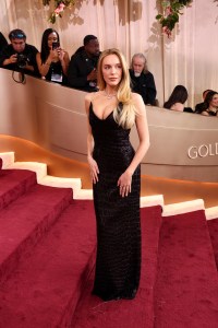 Alex Cooper at the 83rd Annual Golden Globes held at The Beverly Hilton on January 11, 2026 in Beverly Hills, California.