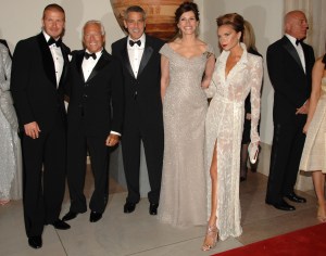 David Beckham, fashion designer Giorgio Armani, actor George Clooney and Victoria Beckham attend the Metropolitan Museum of Art's annual Costume Institute gala in New York City. All wear Armani.