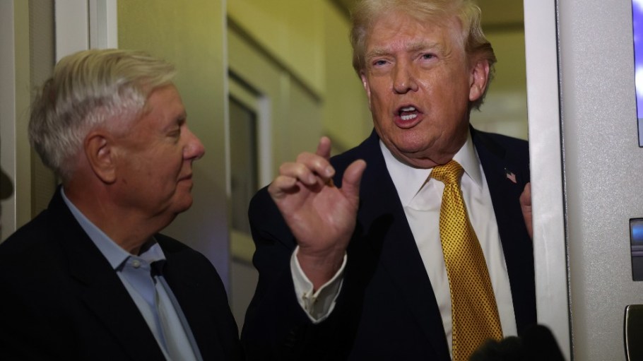 President Donald Trump and Sen. Lindsey Graham (R-S.C.) speak to the media aboard Air Force One en route to Washington, D.C. on Jan. 4.