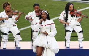 US singer Coco Jones performs "Lift Every Voice and Sing" ahead of Super Bowl LX between the New England Patriots and Seattle Seahawks at Levi's Stadium in Santa Clara, California on February 8, 2026.