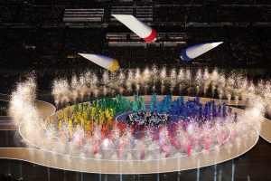 A general view of a parade of performers dressed as symbols of Italian imagination and creativity during the opening ceremony of the Milano Cortina 2026 Winter Olympics.