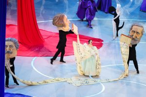 Matilda De Angelis performs with three actors dressed as the great masters of Italian Opera, Giuseppe Verdei, Giacomo Puccini, and Gioachino Rossini during the opening ceremony of the Milano Cortina 2026 Winter Olympics.