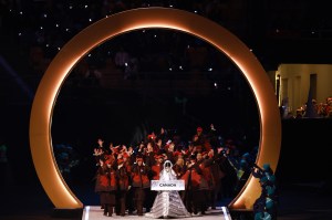 Athletes of Team Canada enter the stadium during the opening ceremony of the Milano Cortina 2026 Winter Olympics at San Siro Stadium on February 06, 2026.
