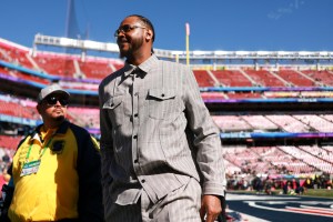 Carmelo Anthony walks on the field prior to Super Bowl LX  between the New England Patriots and the Seattle Seahawks at Levi's Stadium on February 08, 2026 in Santa Clara, California.