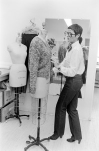 Liz Claiborne and Arthur "Art" Ortenberg are photographed working together on collection designs in the Liz Claiborne atelier