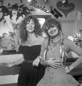 Fashion designer Betsey Johnson and her partner, Chantal Bacon both wearing Johnson's designs in the Betsey Johnson store at 251 E. 60th street on August 18, 1988 in New York...Article title: 'Sportswear Report: Happy Partners Bacon & Johnson (Photo by Fairchild Archive/Penske Media via Getty Images)