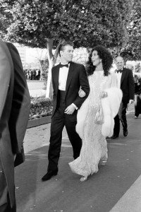 Val Kilmer (L) and Cher (C) attend the 55th Academy Awards at the Dorothy Chandler Pavillion in Los Angeles, California, on April 11, 1983. (Photo by Fairchild Archive/WWD/Penske Media via Getty Images)