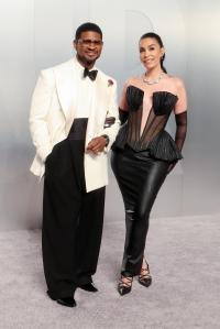 Usher and Jennifer Goicoechea at the 2026 Vanity Fair Oscar Party held at the Los Angeles County Museum of Art on March 15, 2026 in Los Angeles, California.
