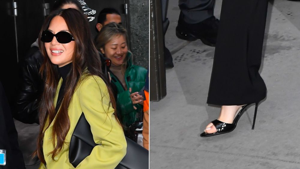 Olivia Munn wears Paris Texas Lidia Mules in a black patent leather finish while on her way to "Good Morning America" on Monday.