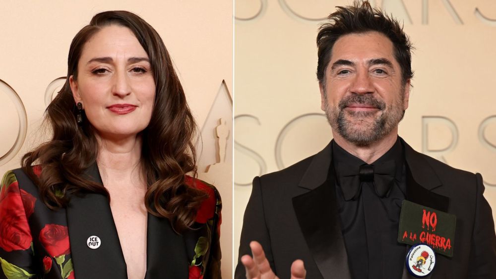 Sara Bareilles wearing ann "ICE OUT" pin and Javier Bardem wearing a "Say No to War" pin and a pin supporting Palestine on the 2026 Oscars red carpet.