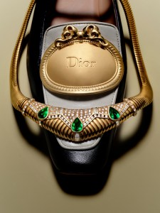 Saidian Vintage Jewels 18-karat yellow gold pear-shaped emerald and diamond necklace; Dior medallion loafer.