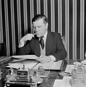 British fashion designer Norman Hartnell at his Bruton Street salon in Mayfair, London, 1947.
