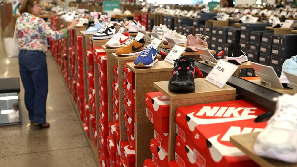 A customer browses for shoes at DSW on September 10, 2025, in a store in Framingham, Mass. (Photo by Jonathan Wiggs/The Boston Globe via Getty Images)