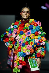 A model presents a creation by FDCI x Pearl Academy First Cut during the Lakmé Fashion Week in Mumbai on March 22, 2026.
