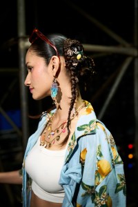 A model poses for pictures backstage after the Max Fashion show at Lakme Fashion Week 2026 on March 22, 2026 in Mumbai, India.