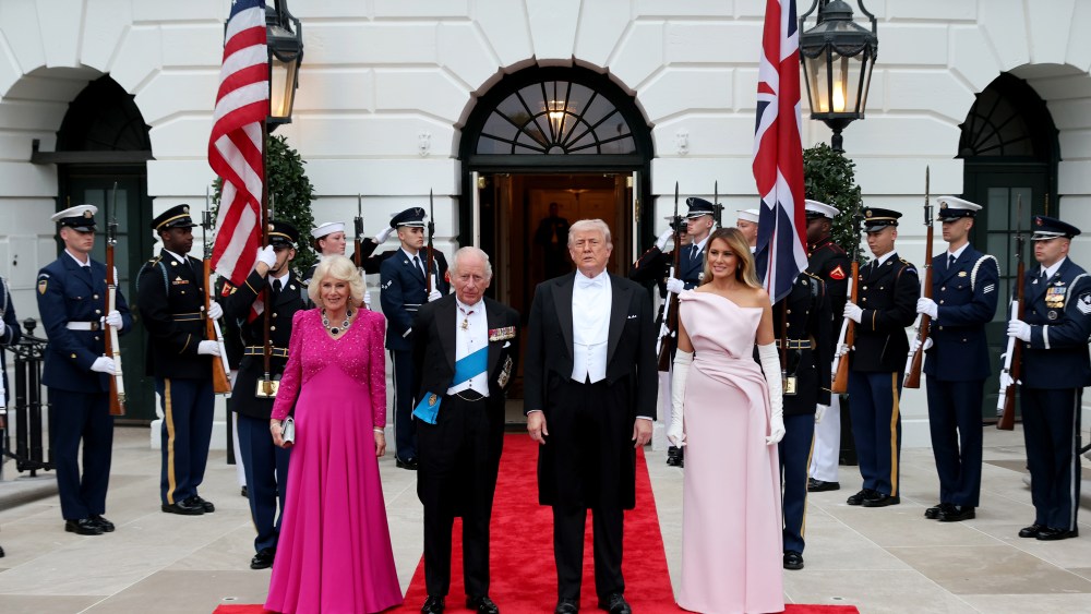 Queen Camilla, King Charles III, U.S. President Donald Trump, and First Lady Melania Trump pose at the base of the Grand Staircase during an official state dinner hosted by the President and First Lady at The White House on day two of the State Visit of King Charles III and Queen Camilla to the United States of America, on April 28, 2026 in Washington, DC. The dinner, part of a trip arranged to celebrate the United States of America's 250th anniversary of its independence, is the first formal white tie event at The White House since President George W. Bush hosted Queen Elizabeth II in 2007.