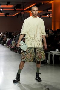 A model walks the runway wearing a look by ESMOD France student designer Clara Pontille and a handbag designed by ESMOD France student Maela Ziegler during LIM College's 81st Annual Fashion Show "Global Fashion Fusion" at The Glasshouse on April 10, 2026 in New York City.