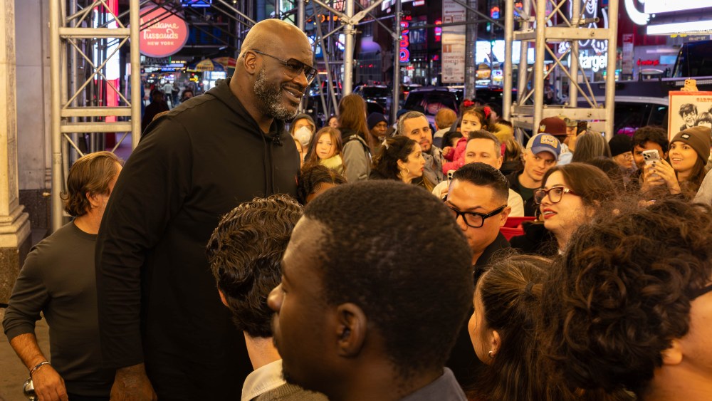 Shaquille O'Neal greets the crowds in Times Square by the tm:rw store.