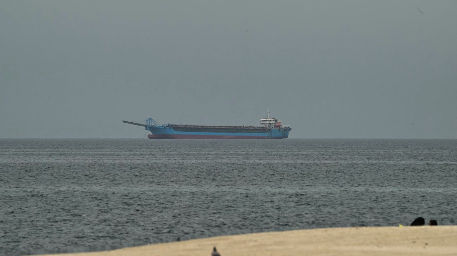 A ship is seen in the Persian Gulf off the coast of Sharjah the day after the failure of U.S.-Iran peace talks on April 13, 2026.