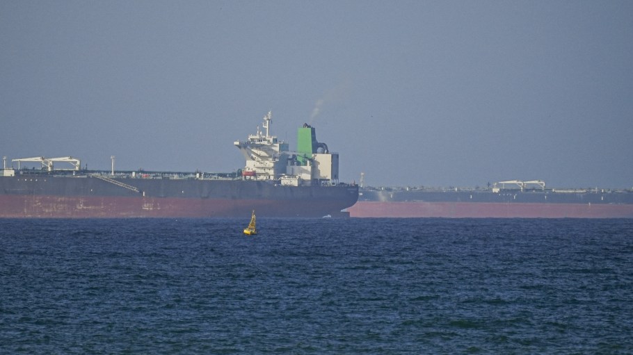 A ship waits to pass through the Strait of Hormuz following the two-week temporary ceasefire between the US and Iran, which is conditional on the opening of the strait, in Oman on April 8, 2026.