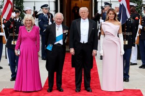 WASHINGTON, DC - APRIL 28: (L-R) Queen Camilla, King Charles III, U.S. President Donald Trump, and First Lady Melania Trump pose outside during an official state dinner hosted by the President and First Lady at The White House on day two of the State Visit of King Charles III and Queen Camilla to the United States of America, on April 28, 2026 in Washington, DC. The dinner, part of a trip arranged to celebrate the United States of America's 250th anniversary of its independence, is the first formal white tie event at The White House since President George W. Bush hosted Queen Elizabeth II in 2007.  (Photo by Chris Jackson/Getty Images)